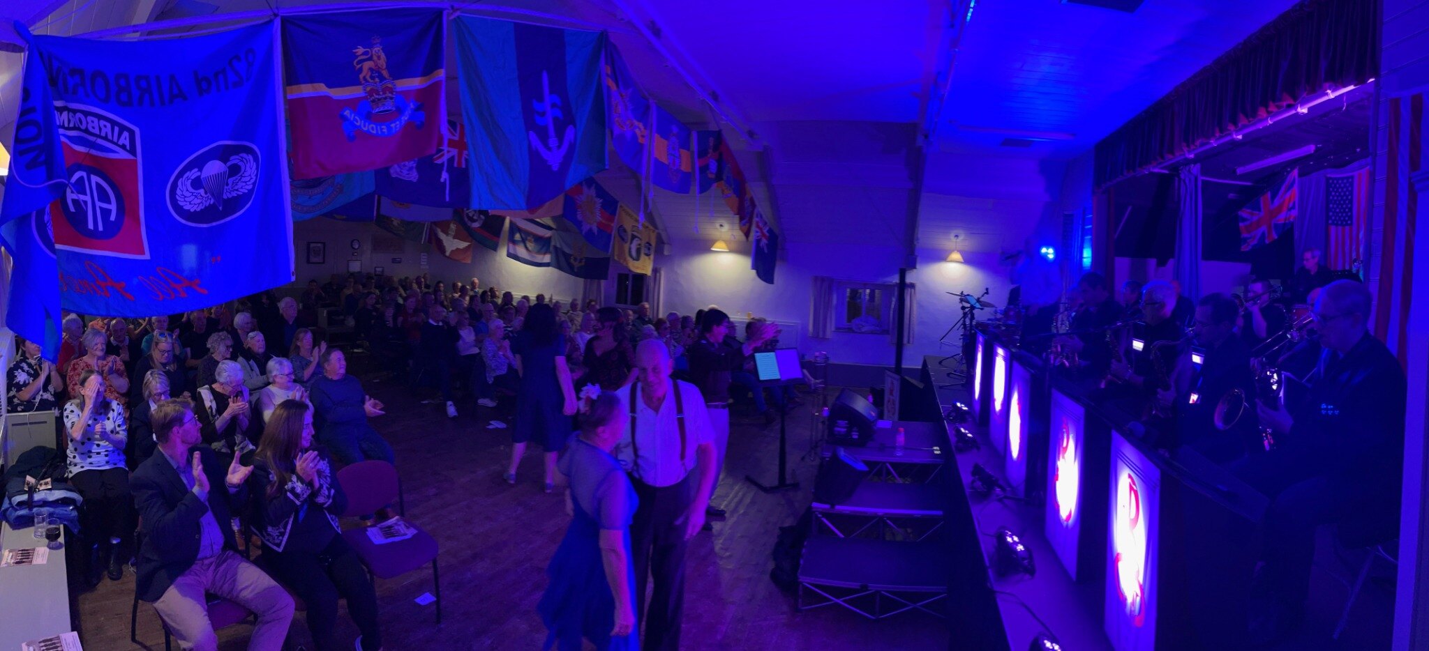 Couples dancing while the Rutland Big Band performs at the Big Band Spectacular
